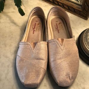 Bob’s slip on gold shoe